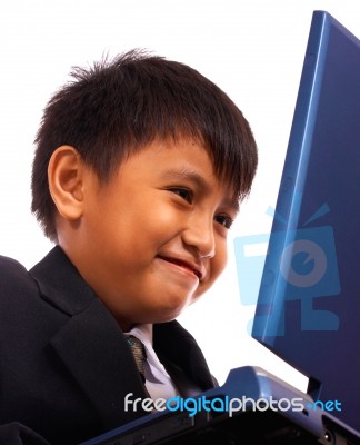 Kid Browsing The Internet Stock Photo