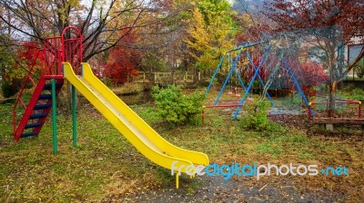 Kid Outdoor Playground With Autumn Color Stock Photo