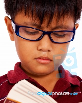 Kid Reading A Book Stock Photo