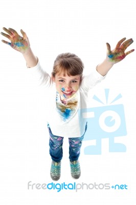 Kid Showing Painted Hands To Camera Stock Photo