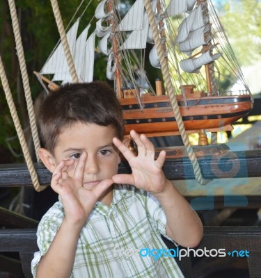 Kid Shows Something Stock Photo