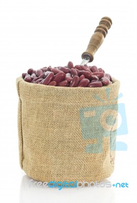 Kidney Beans In Sacks Fodder On White Background Stock Photo