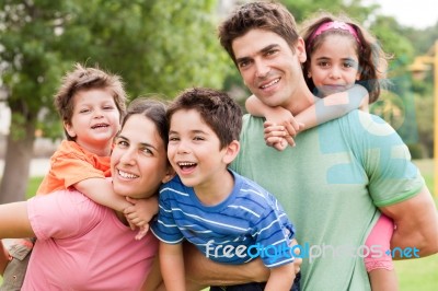 Kids Enjoying Piggyback Ride Stock Photo