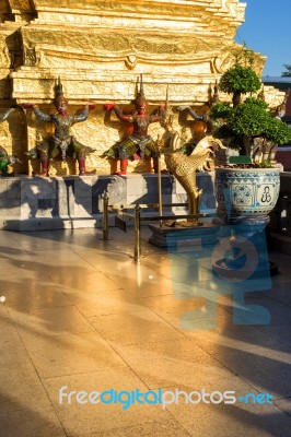 Kinnari And Demon Guardian At Wat Phra Kaew Stock Photo