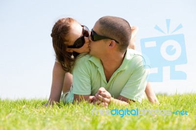 Kissing Young Couple Stock Photo