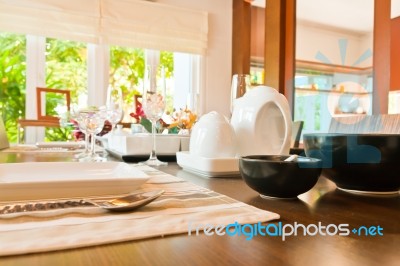 Kitchenware On Wooden Table Stock Photo