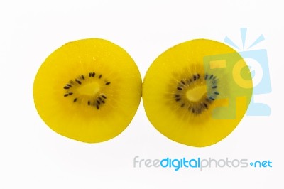 Kiwi Slices Into Half On White Background Stock Photo