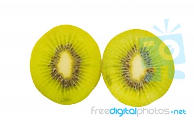 Kiwi Slices Into Half On White Background Stock Photo