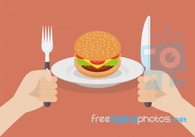 Knife And Fork Cutlery In Hands With Burger Stock Image