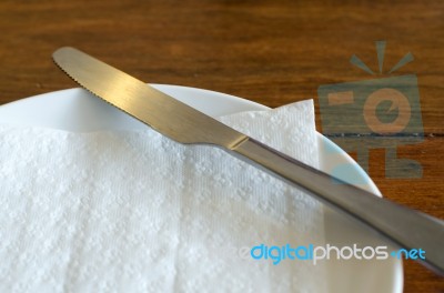 Knife With White Plate Stock Photo