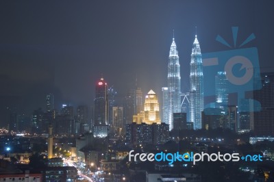 Kuala Lumpur, Malaysia At Night Petronas Bldg Twin Towers Stock Photo