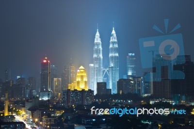 Kuala Lumpur, Malaysia At Night Petronas Bldg Twin Towers Stock Photo