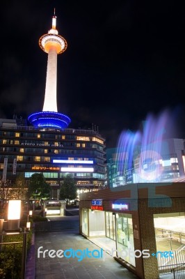 Kyoto Tower With Colorful Fountain Show Stock Photo