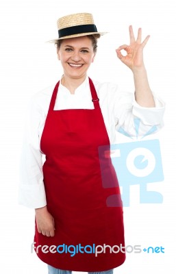 Lady Chef Gesturing Okay Sign Stock Photo