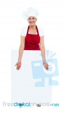 Lady Chef Showing Blank White Board Stock Photo