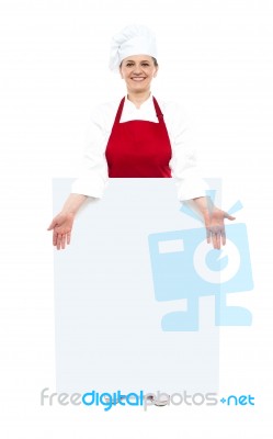 Lady Chef Showing White Blank Board Stock Photo