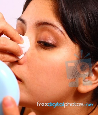 Lady Cleaning Make Up Stock Photo