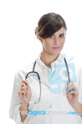 Lady Doctor Holding Stethoscope Stock Photo