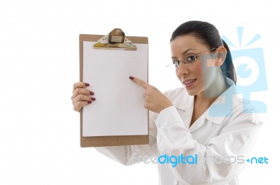 Lady Doctor Pointing Clipboard Stock Photo