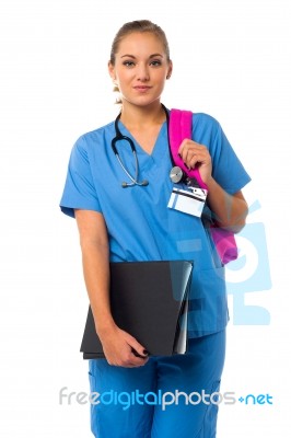 Lady Doctor Posing With Backbag Stock Photo