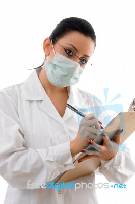 lady Doctor writing Prescription Stock Photo