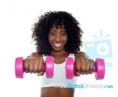 Lady Doing Dumbbell Exercise Stock Photo