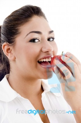 Lady Eating An Apple Stock Photo