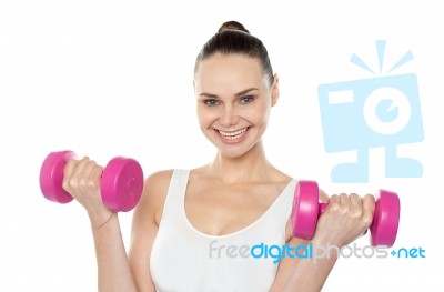 Lady Holding Dumbbells Stock Photo