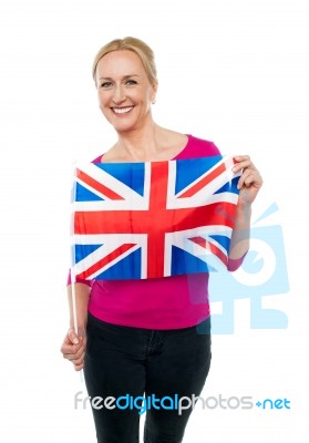 Lady Holding United Kingdom Flag Stock Photo