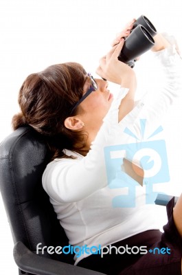 Lady Looking Through Binocular Stock Photo