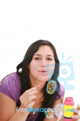 Lady Making Soap Bubbles Stock Photo