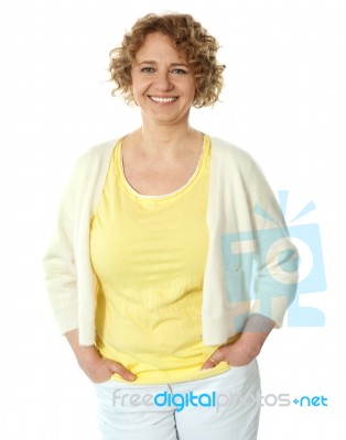 Lady Posing With Hands In Pocket Stock Photo