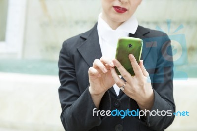 Lady Reading Sms Stock Photo