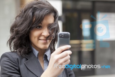 Lady Reading Sms Stock Photo