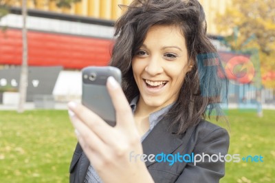 Lady Reading Sms Stock Photo