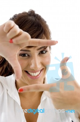 Lady showing framing hand gesture Stock Photo