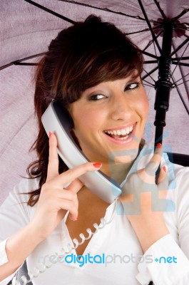 lady Talking On Phone with Umbrella Stock Photo