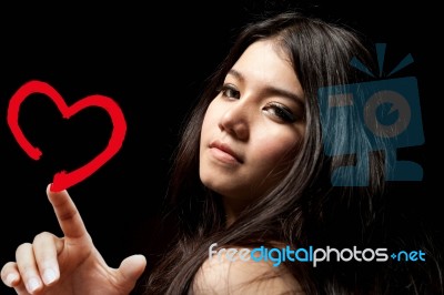 Lady Touching Heart Symbol Stock Photo