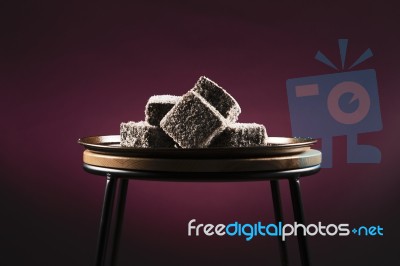 Lamingtons On A Baking Tray Stock Photo