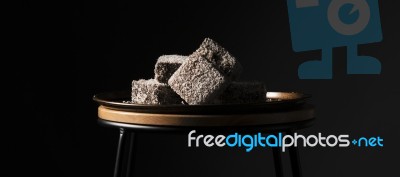 Lamingtons On A Baking Tray Stock Photo