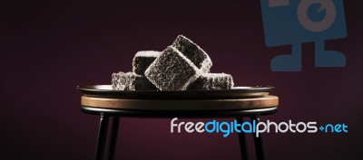 Lamingtons On A Baking Tray Stock Photo