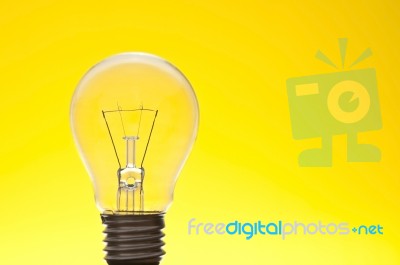 Lamp As Yellow Background Stock Photo