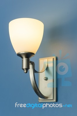 Lamp On A Wall Shining Stock Photo