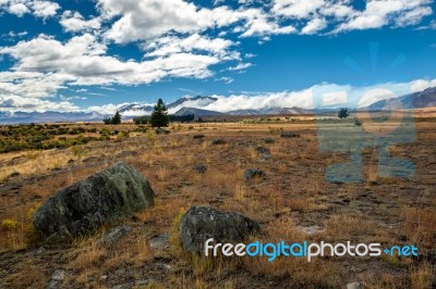 Land Alongside Lake Tekapo Stock Photo