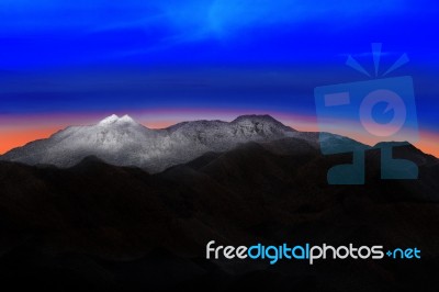 Land Scape Of Snow Mountain Hill With Beautiful Dramatic Colorfu… Stock Photo