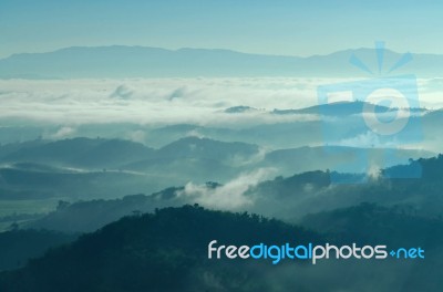 Landscape Of Mountain With The Clouds And Fog Stock Photo