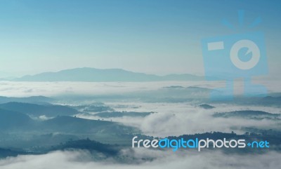 Landscape Of Mountain With The Clouds And Fog Stock Photo