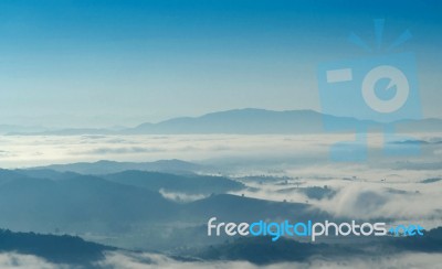 Landscape Of Mountain With The Clouds And Fog Stock Photo