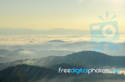 Landscape Of Mountain With The Clouds And Fog Stock Photo