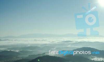 Landscape Of Mountain With The Clouds And Fog Stock Photo